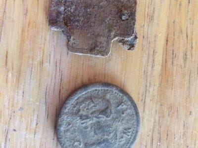 Old dog tag and some kind of token