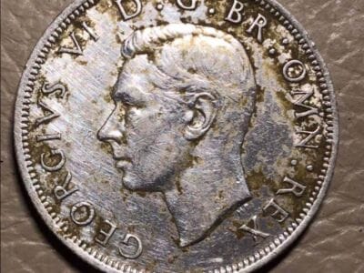 Two silver coins and others